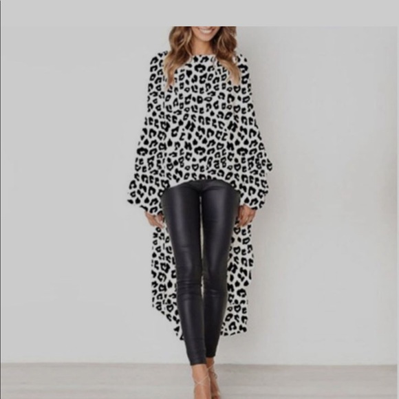 T&J Designs Tops - BLACK & WHITE ANIMAL PRINT RUFFLED DIP HEM BLOUSE